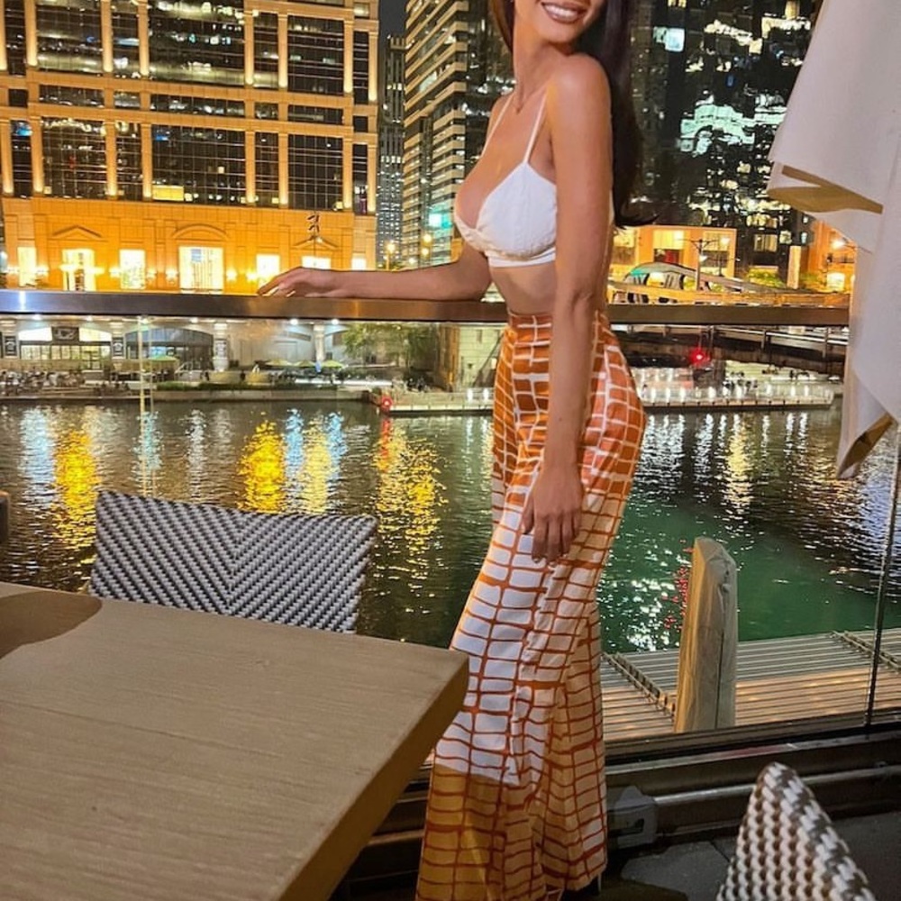 Akira: orange and white patterned silk pants